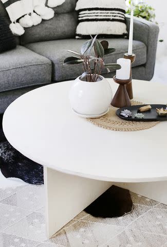 <p><a href="https://themerrythought.com/diy/diy-round-plywood-coffee-table/" data-component="link" data-source="inlineLink" data-type="externalLink" data-ordinal="1">The Merrythought</a></p>