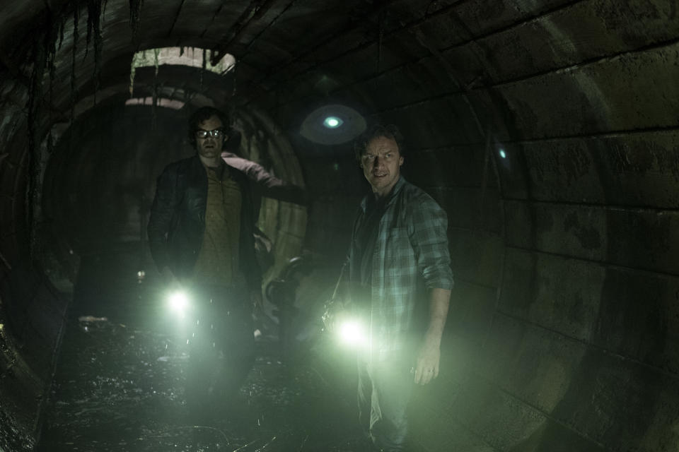Bill Hader and James McAvoy exploring the sewers of Derry in <i>It: Chapter Two</i>. (Warner Bros.)