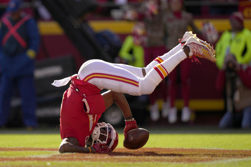 Kansas City Chiefs wide receiver Marquez Valdes-Scantling flips into the end zone after catching a touchdown pass during the first half of an NFL football game against the Jacksonville Jaguars Sunday, Nov. 13, 2022, in Kansas City, Mo. (AP Photo/Charlie Riedel)