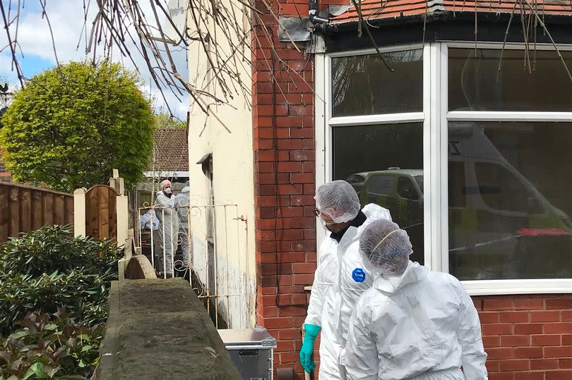 Forensic officers were also seen searching a house in Worsley Road in Winton