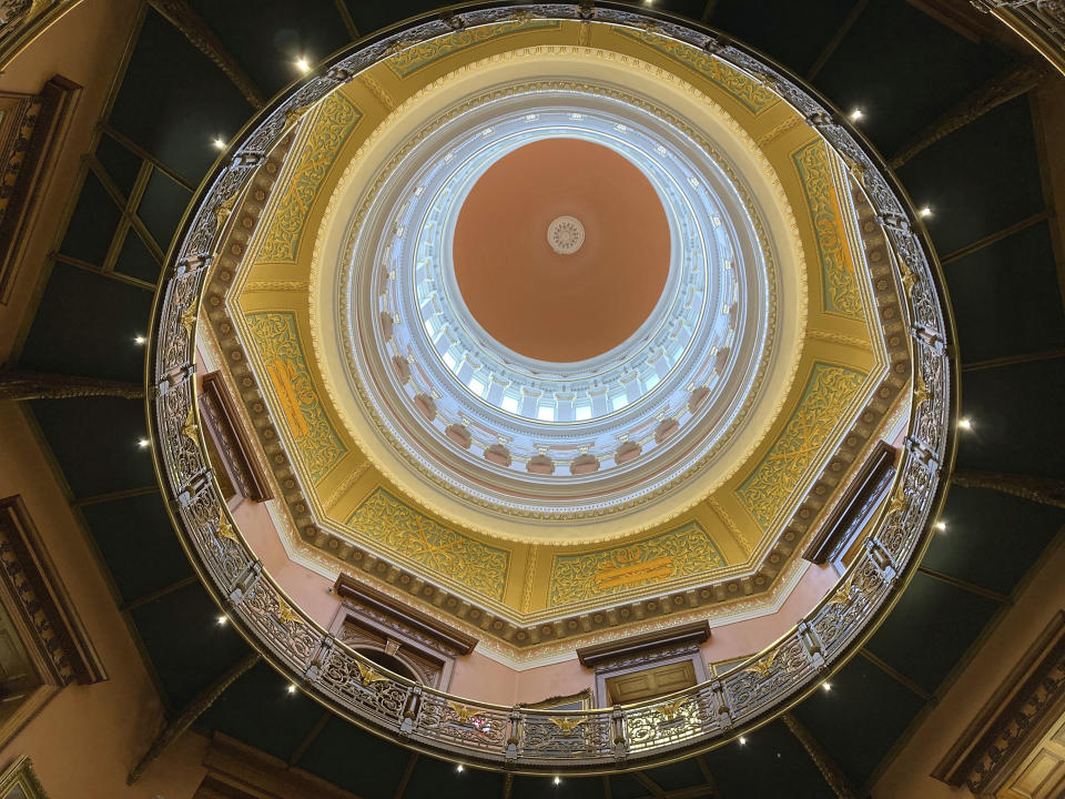 The rotunda at New Jersey's statehouse, along with new lighting, has been spruced up with a new coat of paint to match the way the building looked more than 100 years ago, Wednesday March 22, 2023,, in Trenton, N.J. The building has been reopened and reoccupied by the governor's and other executive staff after a nearly six year, $300-million renovation. (AP Photo/Mike Catalini)