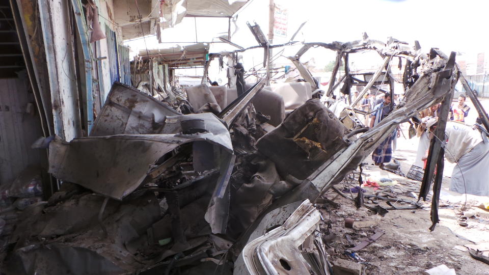 The wreckage of a bus remains at the site of an airstrike in Saada, Yemen on Friday, Aug. 10, 2018. Yemen's Shiite rebels are backing a United Nations' call for an investigation into a Saudi-led coalition airstrike in the country's north that killed dozens of people the previous day, including many children.(AP Photo/Kareem al-Mrrany)