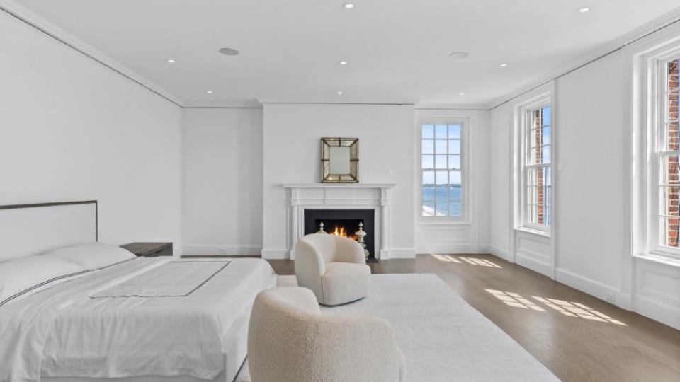 Each bedroom feels bright and airy, made to highlight the ocean views. - Credit: Douglas Elliman