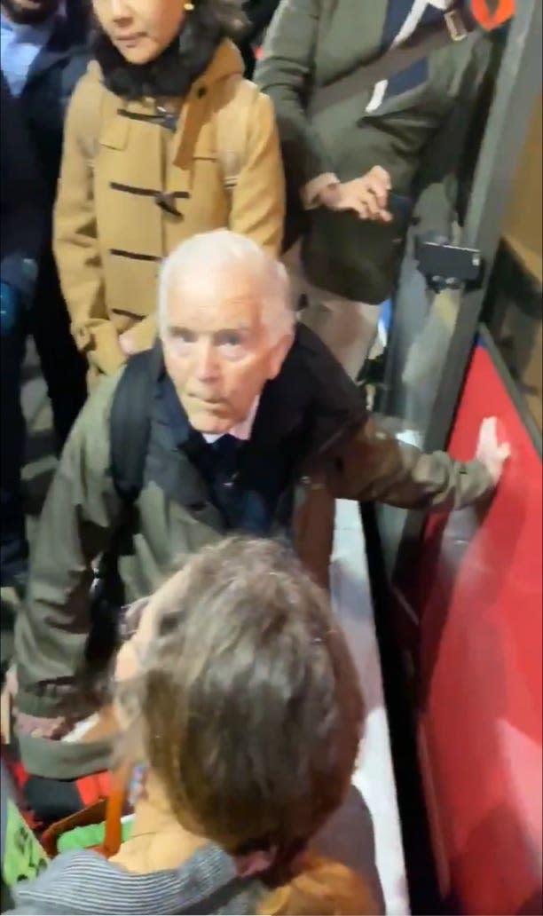 Extinction Rebellion protester Phil Kingston who has glued himself to a DLR train at Shadwell in east London (Max Kara/PA)s