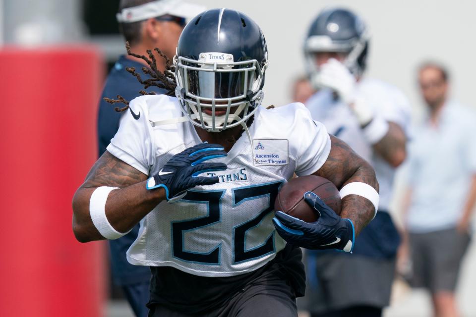 Tennessee Titans running back Derrick Henry (22) races up the field during practice at Saint Thomas Sports Park Tuesday, June 14, 2022, in Nashville, Tenn. 