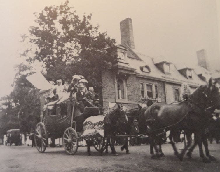 Jacob Schorr is operating the old Hiawatha stage coach on Harford Street, Milford, Pa., in the 4th of July parade in 1916. Schorr was 80 at the time. Forest Hall is in the back.
Image: Heritage 250 image