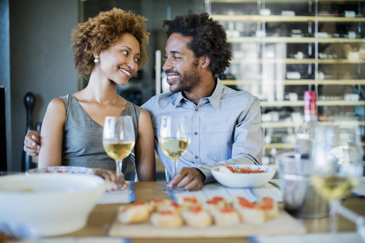 Happy couple having dinner