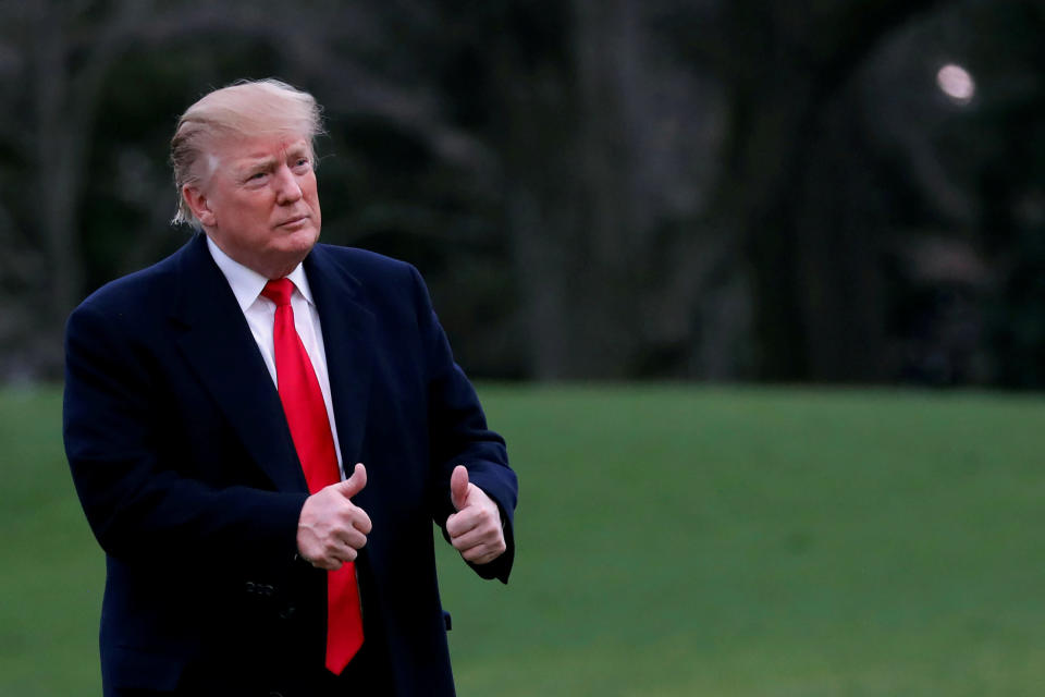 President Donald Trump reacts as he returns to the White House after Attorney General William Barr reported to congressional leaders on the special counsel's report on March 24, 2019.&nbsp; (Photo: Carlos Barria / Reuters)