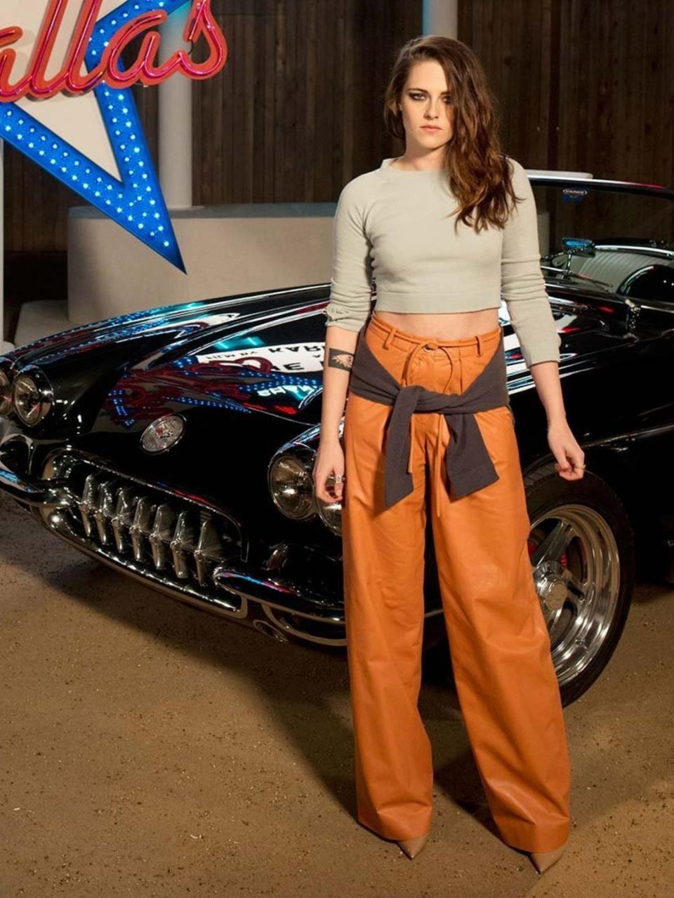 <p>Kristen Stewart at <a href="http://www.elleuk.com/star-style/red-carpet/chanel-metiers-d-art-show-texas-catwalk-karl-lagerfeld-kirsten-stewart-dakota-fanning" rel="nofollow noopener" target="_blank" data-ylk="slk:Chanel's Metiers d'Art show;elm:context_link;itc:0;sec:content-canvas" class="link ">Chanel's Metiers d'Art show</a> at Fair Park in Dallas, wearing a cropped jumper and terracotta leather trousers from <a href="http://www.elleuk.com/catwalk/designer-a-z/chanel/spring-summer-2014/collection" rel="nofollow noopener" target="_blank" data-ylk="slk:Chanel's s/s 2014;elm:context_link;itc:0;sec:content-canvas" class="link ">Chanel's s/s 2014</a> collection.</p>