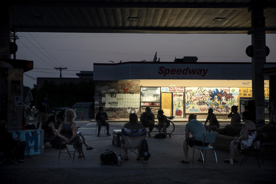 Local residents hold a town hall in Minneapolis on Aug. 25, 2020. Residents and activists meet at the Speedway gas station to discuss building up their community, racial justice and ongoing concerns. (Ed Ou / NBC News)