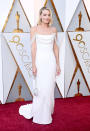 <p>Margot Robbie, of <i>I, Tonya</i>, stunned in a white Chanel number. Her gown choice makes sense, since Robbie is the brand’s <a rel="nofollow noopener" href="https://www.vogue.com.au/fashion/news/margot-robbie-announced-as-chanels-newest-ambassador/news-story/cc3d13c37310badf9b2576084d78008f" target="_blank" data-ylk="slk:new ambassador;elm:context_link;itc:0;sec:content-canvas" class="link ">new ambassador</a>. Her nomination in the Best Actress category was her first. (Photo: Getty Images) </p>