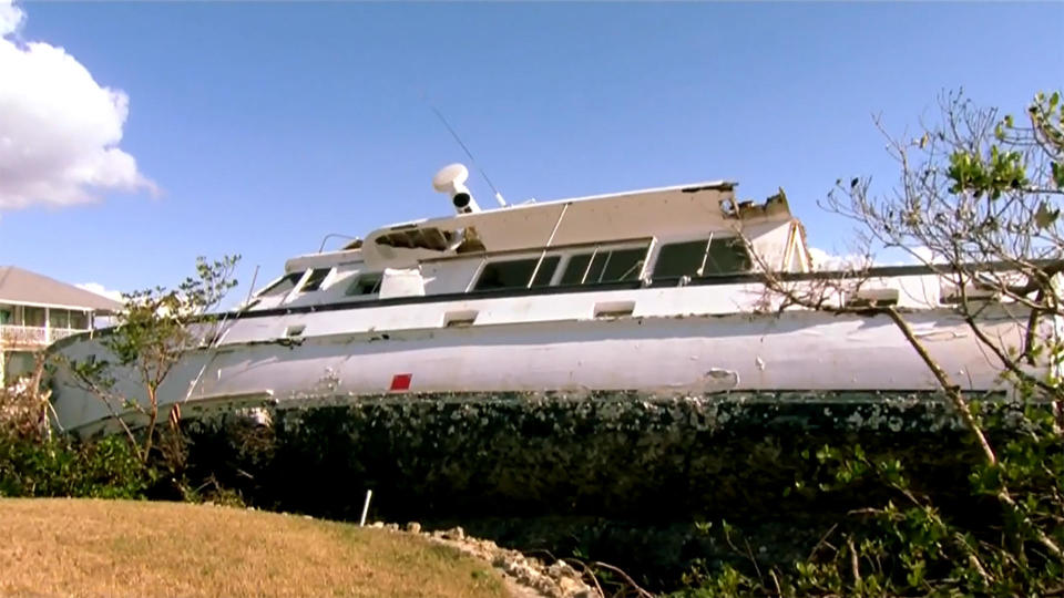 Jim Beyer's 65-foot-boat Taboo washed up onto his neighbor's backyard. / Credit: CBS News