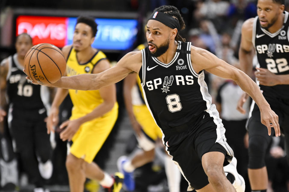 San Antonio Spurs' Patty Mills runs upcourt during the second half of an NBA basketball game against the Indiana Pacers, Monday, March 2, 2020, in San Antonio. (AP Photo/Darren Abate)