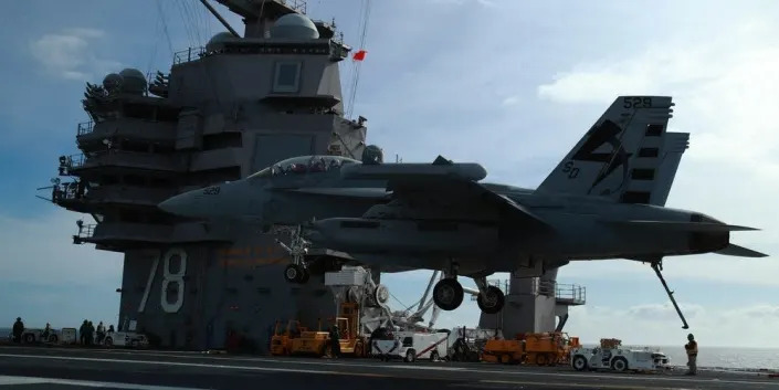 An EA-18G Growler, assigned to Air Test and Evaluation Squadron (VX) 23, prepares to land aboard USS Gerald R. Ford's (CVN 78) flight deck.