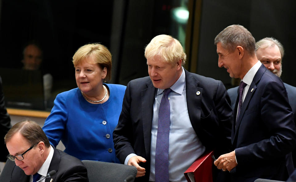 Britain's Prime Minister Boris Johnson, German Chancellor Angela Merkel, Czech Republic's Prime Minister Andrej Babis and Sweden's Prime Minister Stefan Lofven attend the European Union leaders summit dominated by Brexit, in Brussels, Belgium October 17, 2019. REUTERS/Piroschka van de Wouw