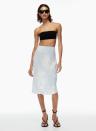 <p>aritzia.com</p><p><strong>$54.99</strong></p><p><a href="https://www.aritzia.com/us/en/product/slip-midi-skirt/100731.html" rel="nofollow noopener" target="_blank" data-ylk="slk:Shop Now" class="link ">Shop Now</a></p><p>I love a soft-meets-edgy combo. Toughen up this satin midi's gentle blue hue with wear a black tube top and some shades.</p>
