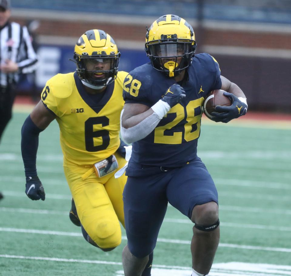 Michigan Wolverines running back Benjamin Hall scores a touchdown during the spring game Saturday, April 1, 2023 at Michigan Stadium.