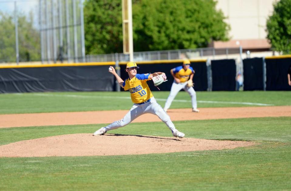 Turlock pitcher Mason Baker delivers a pitch during a CCAL matchup with Turlock at Enochs High School in Modesto, Calif. on Friday, April 19, 2024.