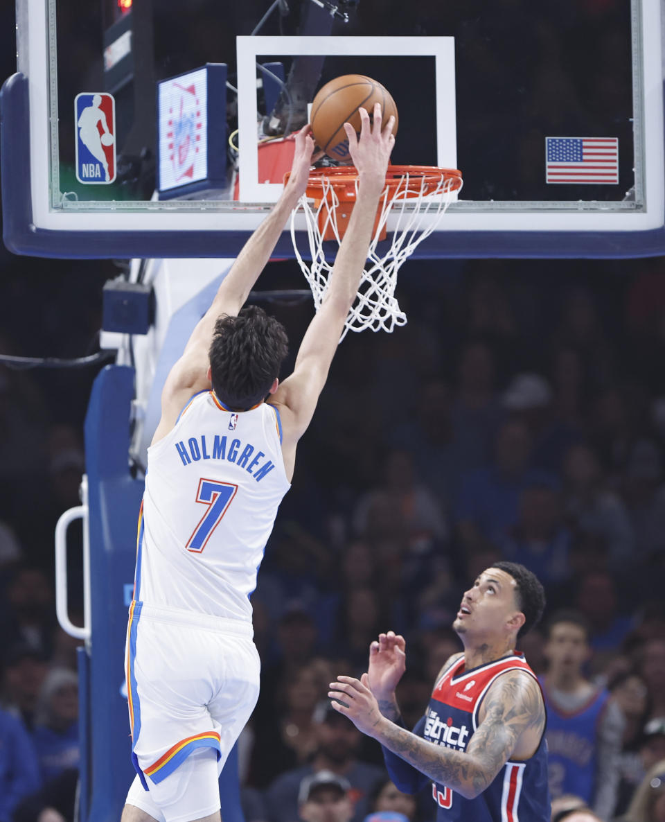 Feb 23, 2024; Oklahoma City, Oklahoma, USA; Oklahoma City Thunder forward Chet Holmgren (7) dunks as during the first quarter at Paycom Center. Mandatory Credit: Alonzo Adams-USA TODAY Sports