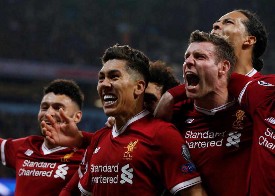 <p>Soccer Football – Champions League Quarter Final Second Leg – Manchester City vs Liverpool – Etihad Stadium, Manchester, Britain – April 10, 2018 Liverpool’s Roberto Firmino celebrates scoring their second goal with James Milner and teammates REUTERS/Andrew Yates </p>