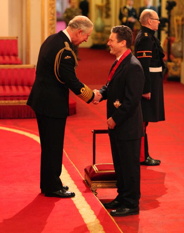 Former Director of Public Prosecutions Sir Keir Starmer is knighted by the then-Prince of Wales in 2014