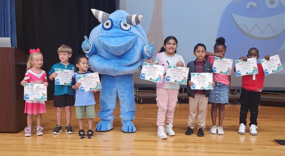 During Snargg's visit he presented certificates to students at each school who have earned specific achievements through their use of the iReady program.