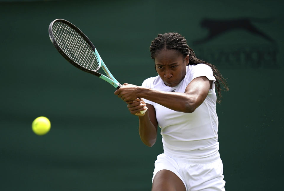 Coco Gauff of the US, returns a shot, during a practice session ahead of the 2022 Wimbledon Championship at the All England Lawn Tennis and Croquet Club, Wimbledon, London, Saturday, June 25, 2022. (John Walton/PA via AP)