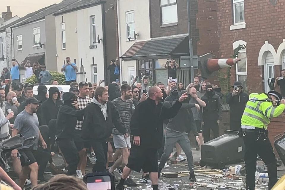 Riots break out at a demonstration in Southport on Monday evening (PA Wire)