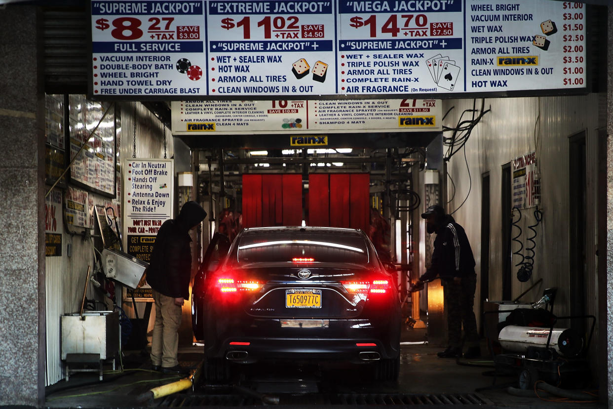 NEW YORK, NY - JANUARY 20: A car pulls into the Vegas Auto Spa where workers are on strike on January 20, 2015 in New York City.  Eight workers from the popular car wash have filed a federal lawsuit against their employer and have been on strike for two months over issues of pay, hours, safe working conditions and the right to join a union. The suit alleges that they were paid less than minimum wage and it demands $600,000 in overtime and other back wages. The car wash industry has a long history with issues of worker exploitation in America.  (Photo by Spencer Platt/Getty Images)