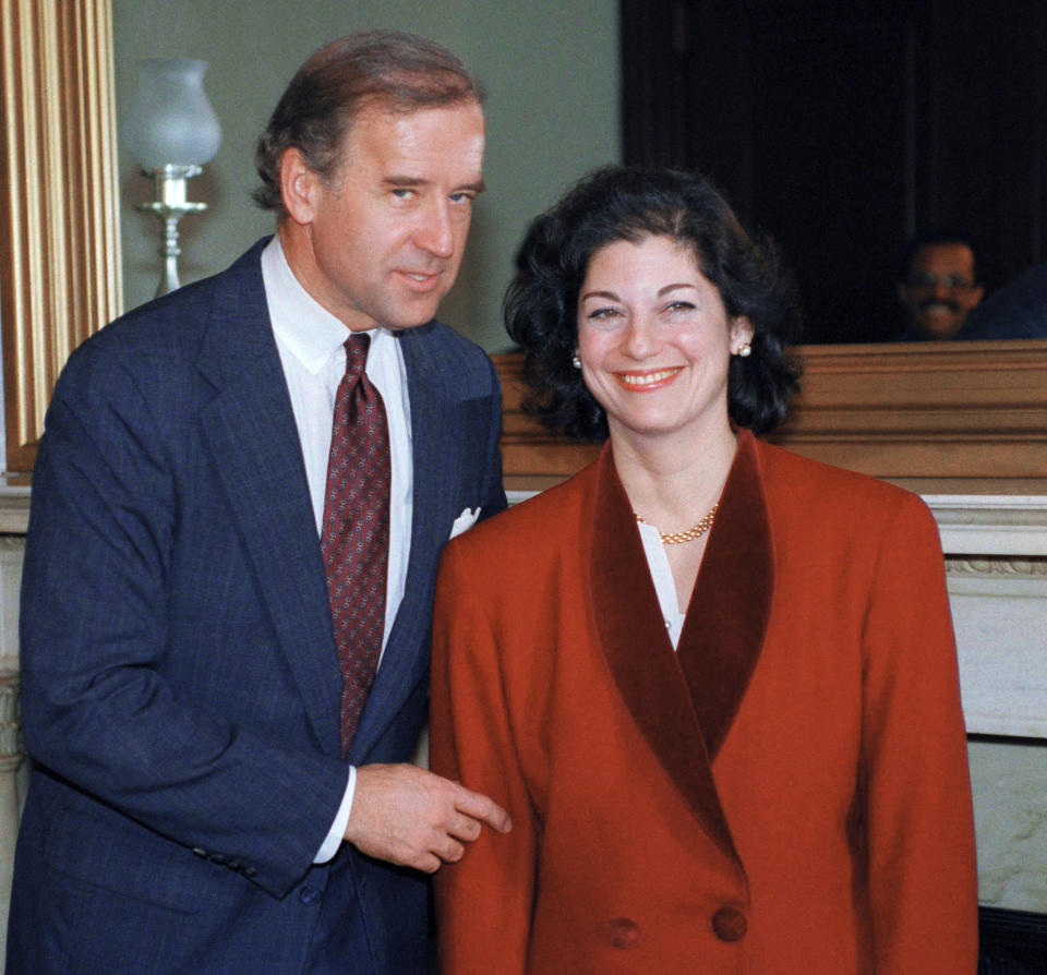 FILE - In this Jan. 6, 1993, file photo, Attorney General-designate Zoe Baird meets with Sen. Joseph Biden (D-Del.), chairman of the Senate Judiciary Committee, on Capitol Hill in Washington. This image has circulated widely on social media in early May 2020 with false claims that it shows Democratic presidential candidate Biden posing with Tara Reade, a former Senate staffer who alleges he assaulted her 27 years earlier. (AP Photo/Ron Edmonds, File)