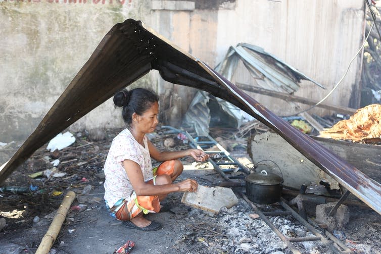 <span class="caption">Campaigners believe that climate change caused by the Carbon Majors is breaching the rights of Filipino people to basics such as food, water and shelter whenever a typhoon strikes and destroys entire communities.</span> <span class="attribution"><a class="link " href="https://www.shutterstock.com/image-photo/14-november-2013-tacloban-philippines-typhoon-615584807" rel="nofollow noopener" target="_blank" data-ylk="slk:Shutterstock;elm:context_link;itc:0;sec:content-canvas">Shutterstock</a></span>