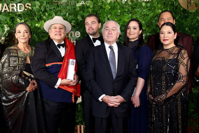 <p>Mike Coppola/Getty Images for The Gotham Film & Media Institute</p> The "Killers of the Flower Moon" cast pose for a photo at The 2023 Gotham Awards.