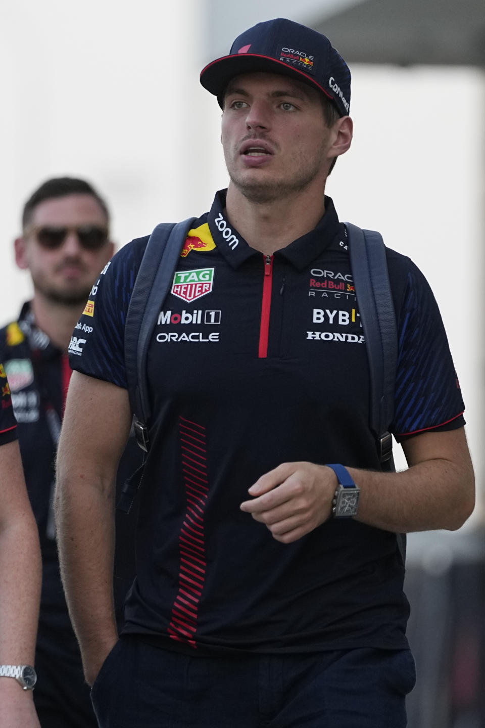 Red Bull driver Max Verstappen of the Netherlands walks through the paddock at the Lusail International Circuit, Lusail, Qatar, Thursday, Oct. 5, 2023. The Qatar Formula One Grand Prix race will be held on Sunday. (AP Photo/Ariel Schalit)