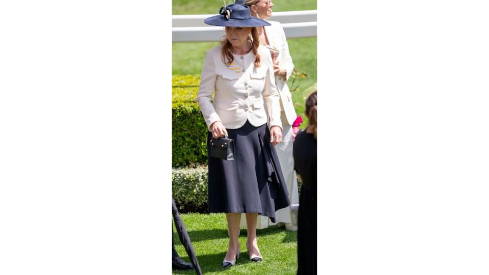 Sarah Ferguson wearing white and navy outfit