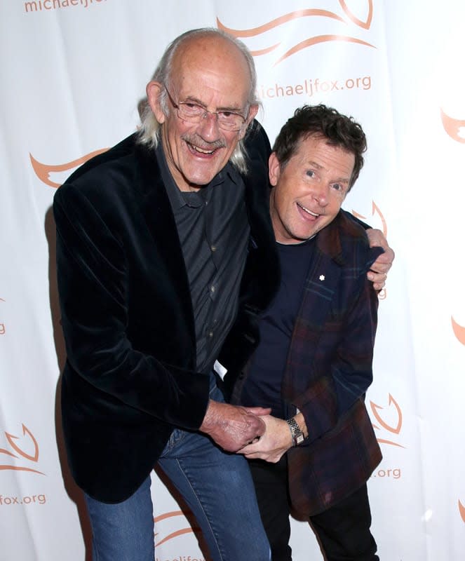 Michael J. Fox y Christopher Lloyd en la velada de la fundación del actor