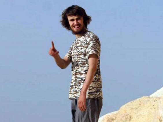 The jury was shown a photo of Jack Letts posing at the Tabqa Dam outside Raqqa (Facebook)