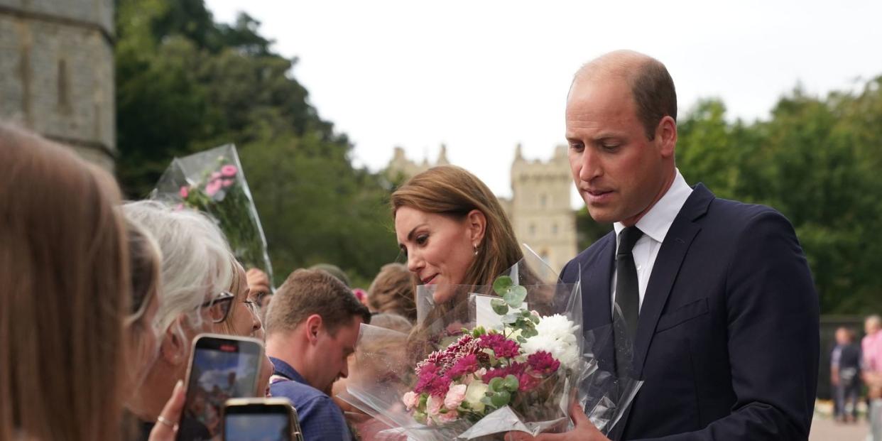 windsor, england   september 10 catherine, princess of wales and prince william, prince of wales meet members of the public at windsor castle on september 10, 2022 in windsor, england crowds have gathered and tributes left at the gates of windsor castle to queen elizabeth ii, who died at balmoral castle on 8 september, 2022 photo by kirsty oconnor   wpa poolgetty images