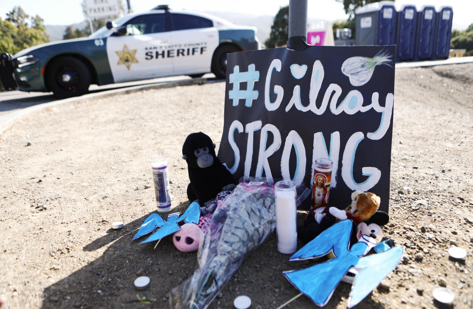 A makeshift memorial outside the site of the Gilroy Garlic Festival, where a shooter killed three people and injured at least a dozen others. (Photo: Mario Tama via Getty Images)