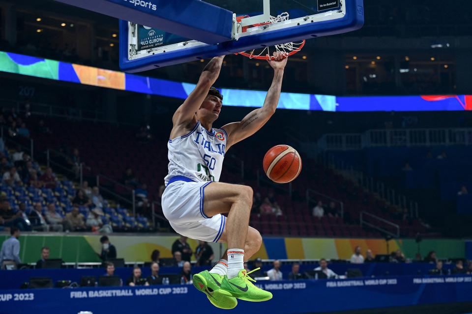 Italy's Gabriele Procida dunks the ball during the FIBA Basketball World Cup classification semifinal match vs. Latvia in Manila, Philippines on Sept. 7, 2023.