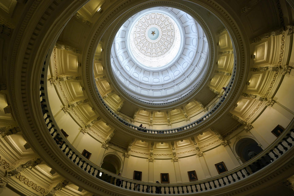 Visitors walk through the rotunda of the Texas Capitol during day three of the impeachment trial for Texas Attorney General Ken Paxton in the Senate Chamber, Thursday, Sept. 7, 2023, in Austin, Texas. (AP Photo/Eric Gay)