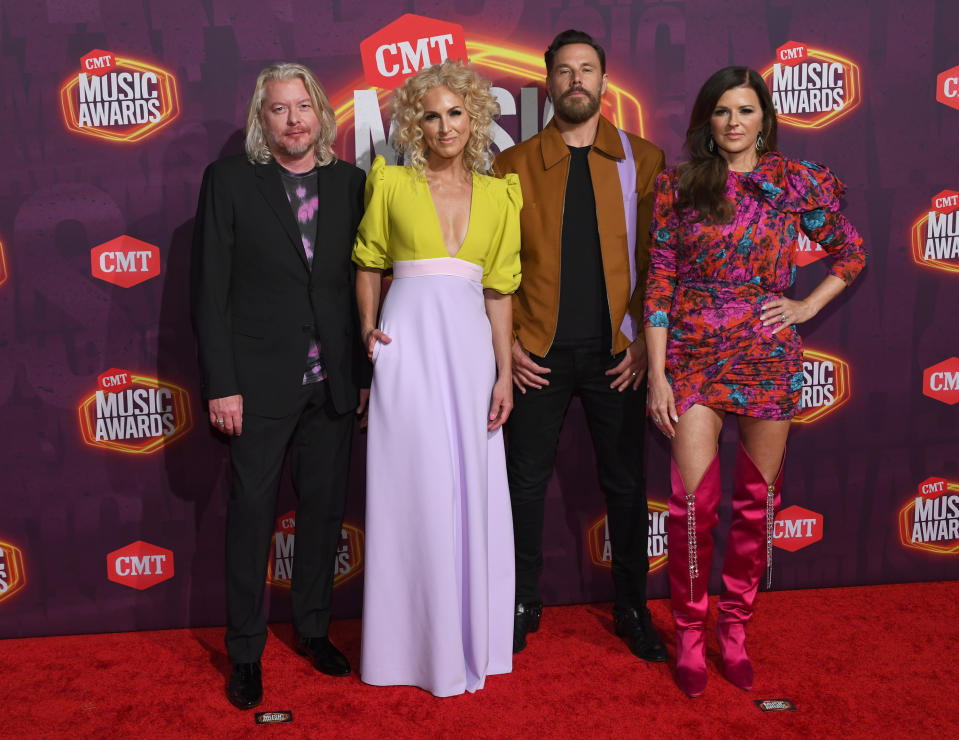 Philip Sweet, from left, Kimberly Schlapman, Jimi Westbrook, and Karen Fairchild of Little Big Town arrive at the CMT Music Awards at the Bridgestone Arena on Wednesday, June 9, 2021, in Nashville, Tenn. (AP Photo/John Amis)