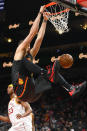 Atlanta Hawks center Alex Len dunks during the first half of an NBA basketball game against the Indiana Pacers, Saturday, Jan. 4, 2020, in Atlanta. (AP Photo/John Amis)