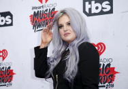 Television personality Kelly Osbourne poses at the 2016 iHeartRadio Music Awards in Inglewood, California, April 3, 2016. REUTERS/Danny Moloshok