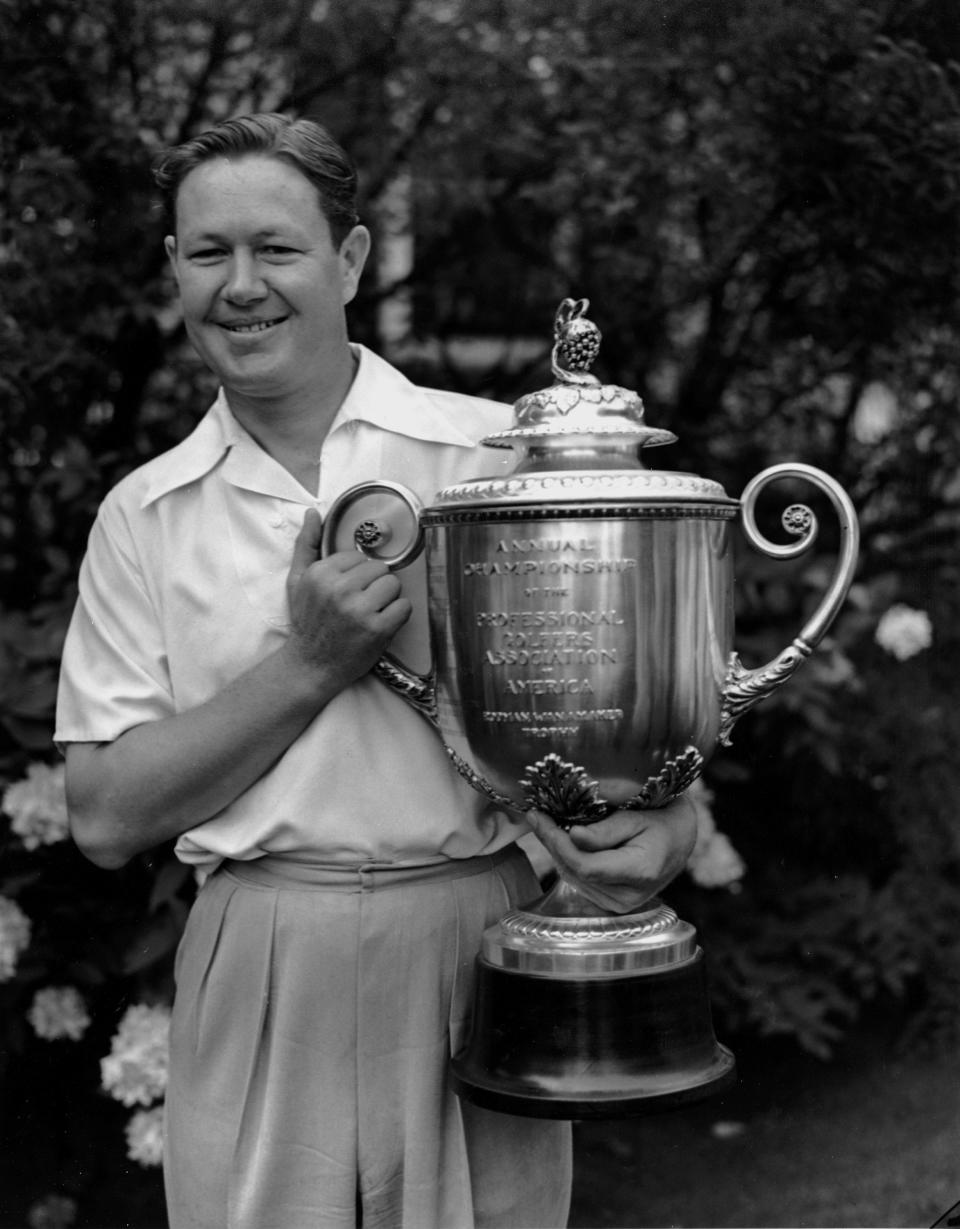 Byron Nelson is holding his trophy after winning the PGA championship in Hershey, PA., on Sept. 2, 1939. Nelson, who had the greatest year in the history of professional golf when he won 18 tournaments in 1945, including a record 11 in a row, died Tuesday Sept. 26, 2006. He was 94.