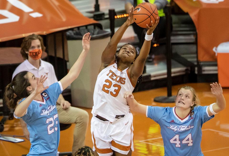 Louisiana Tech forward Irene Murua (23) watches as Texas forward Deyona' Gaston pulls down a rebound on Dec. 2, 2020 in Austin, Texas.