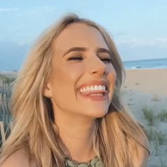 Emma Roberts laughing during the video