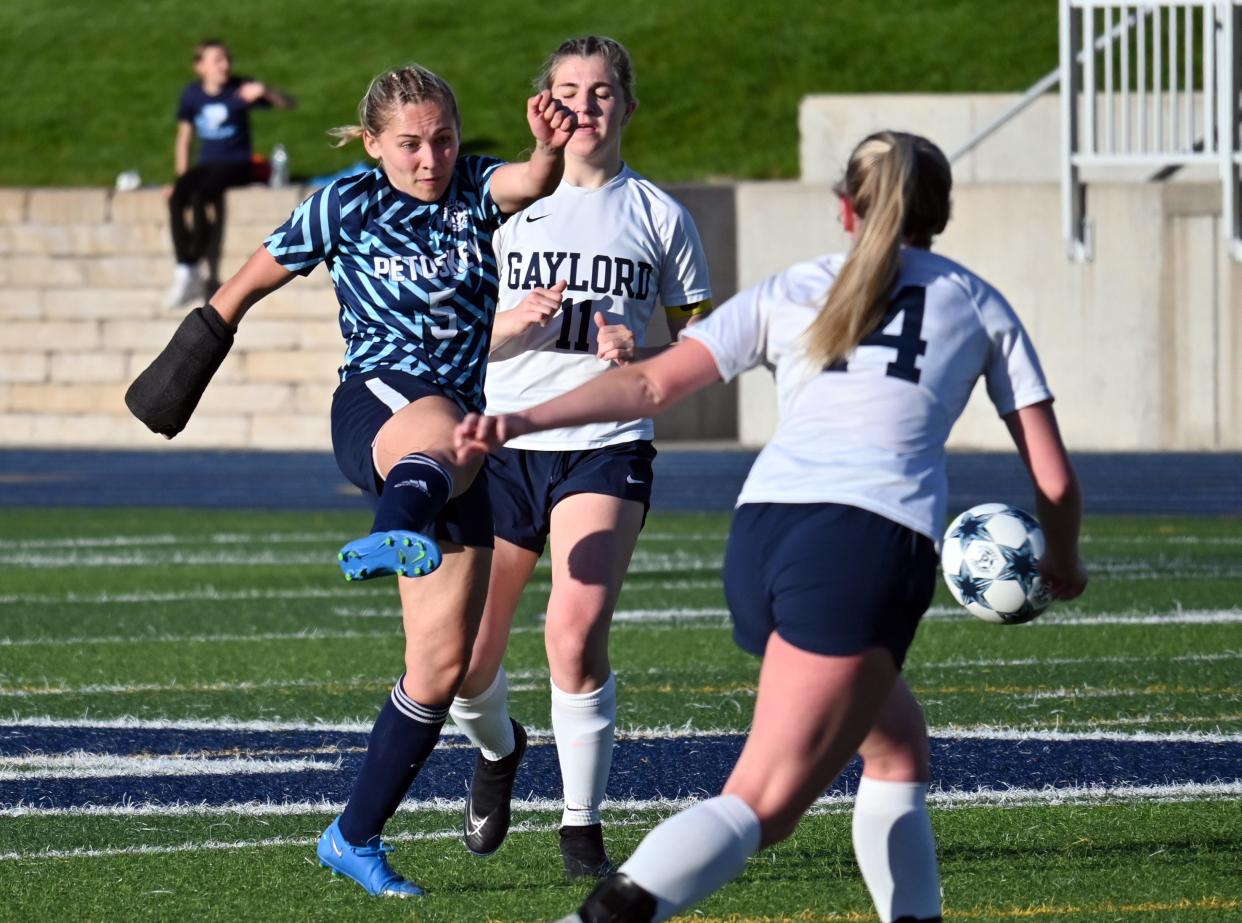 Petoskey's Clara Mailloux gets a one-timer touch on the ball at midfield during the first half of Thursday's BNC match against Gaylord.