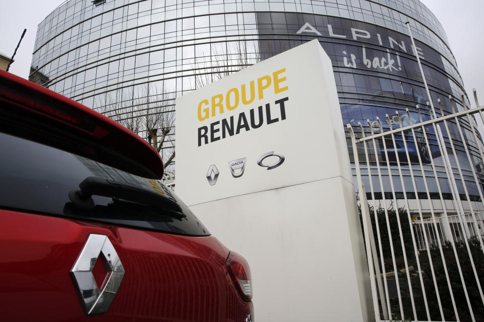 This photo taken on Thursday, Jan. 24, 2019 show a Ranult car parking outside the French carmaker headquarters in Boulogne-Billancourt, outside Paris, France. French carmaker Renault looks set to give its approval to Fiat Chrysler's merger offer. The company's board is meeting Tuesday afternoon at its headquarters to decide on a deal that could reshape the global auto industry. (AP Photo/Christophe Ena)