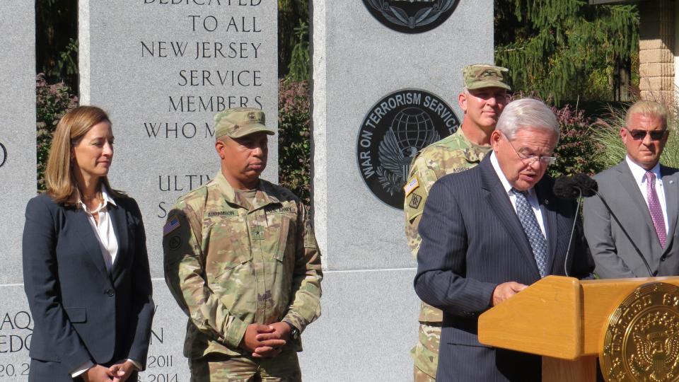 From left, Rep. Mikie Sherrill, Picatinny Commanding General Alfred F. Abramson III, Col. Thomas Asbury and Mark Pederson of NJDEP, stand behind Sen. Robert Menendez during the announcement of a new $41 million munitions disassembly complex at picatinny Arsenal. Oct. 15, 2019.