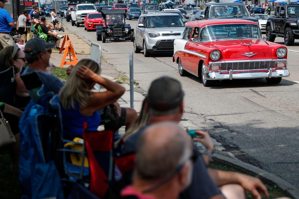 Classic and modern vehicles cruise on Woodward Avenue in Royal Oak during the Woodward Dream Cruise on August 21, 2021.